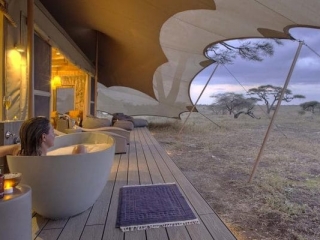 wetu_-_namiri_plains_-_tent_deck_bathtub